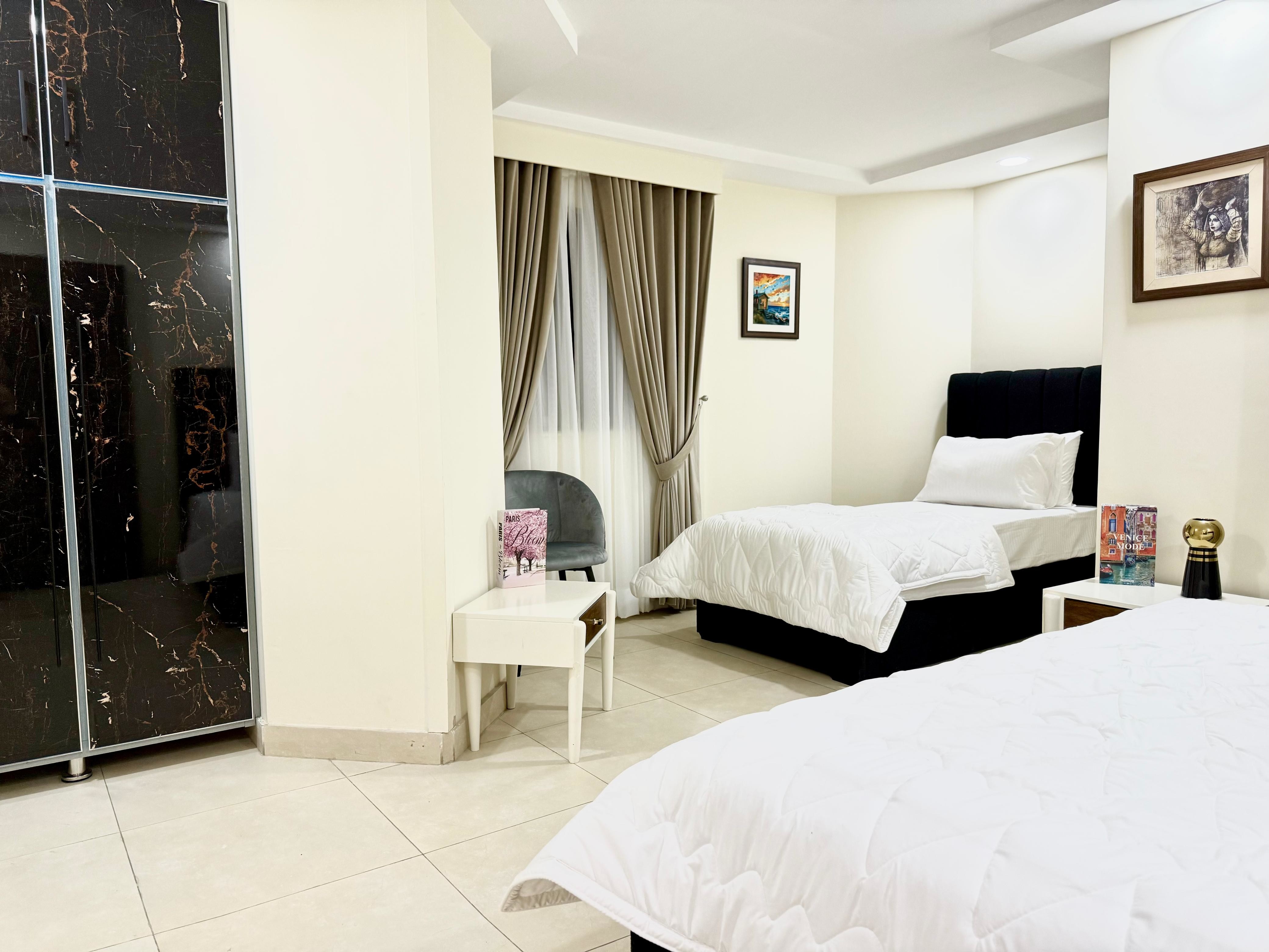 Triple Comfort Apartment – 1BR with Double & Single Bed